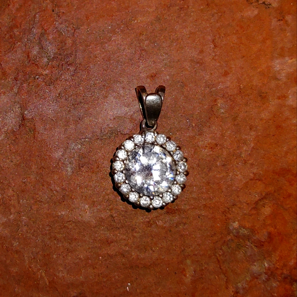 Fused Alloy Silver pendant; round diamond stones